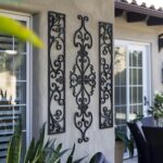 Unlock the Enchanting Charm of Wrought Iron Wall Decor for Outdoor Spaces.