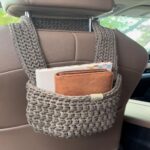 Cozy Crochet Sanctuary Elevates Bathroom Ambiance.