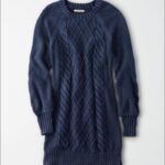Timeless Knit Dress Elevated with Chic Cable Detailing. Timeless Knit Dress Elevated with Chic Cable Detailing.