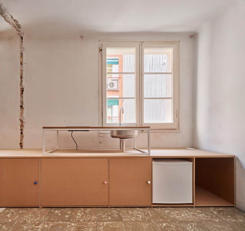 10K House in Barcelona, renovated with a budget of 10,000 euros, showcases raw aesthetics with visible dismantled fixtures.