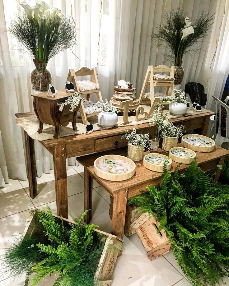 Enchanting Rustic Bridal Shower Ideas for a Memorable Celebration. 5 Wooden table with sweets and ferns