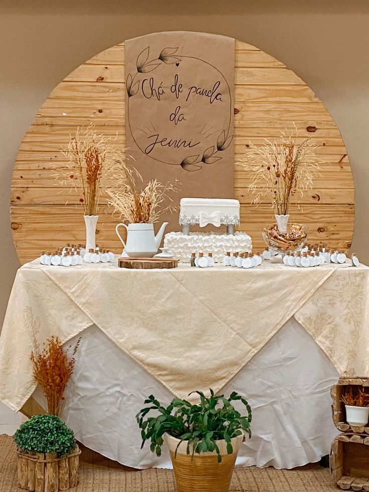 Enchanting Rustic Bridal Shower Ideas for a Memorable Celebration. 2 Table decorated with wooden backdrop