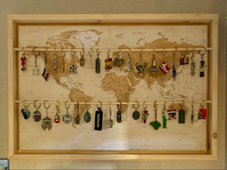 Transform Your Space with Meaningful Emotional Decoration Ideas. 4 Frame with travel keychains