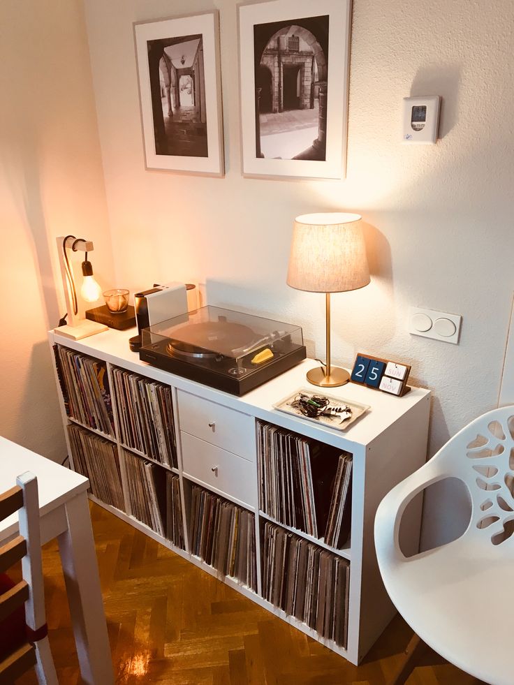 Unique Ways to Display Vinyl Records in Home Décor. 3 White wooden console for records