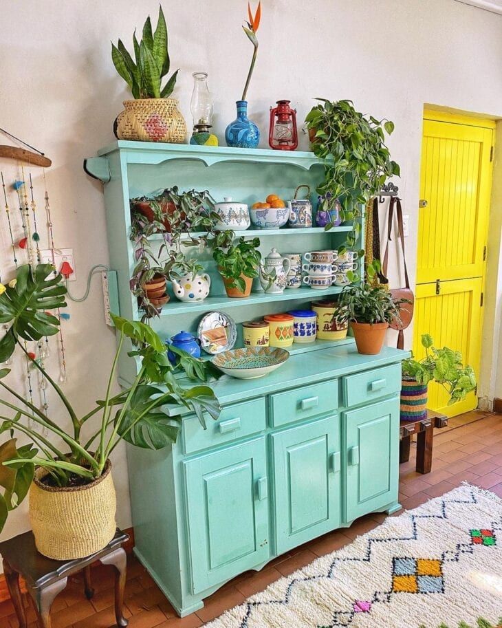 Timeless Charm: Vintage Movies Transforming Your Decor Aesthetics. 1 Light blue kitchen cabinet