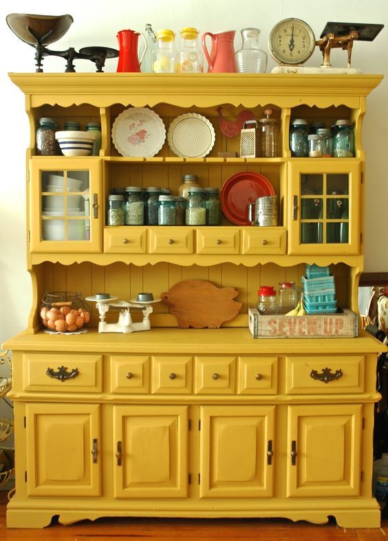 Timeless Charm: Vintage Movies Transforming Your Decor Aesthetics. 8 Yellow kitchen cabinet
