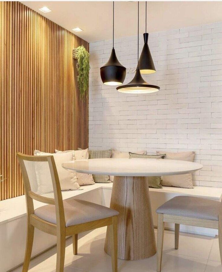 Transform Your Home with Stunning Decorative Pendants Today. 1 Dining room with black pendants in neutral colors