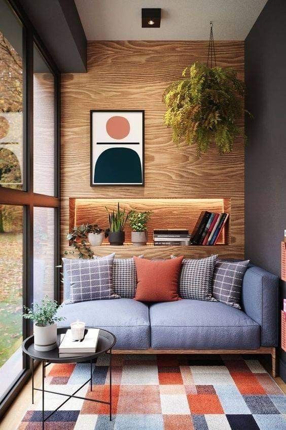 Transform Your Small Walls with Stunning Decor Ideas. 9 Wooden-toned wall, frame, and fern