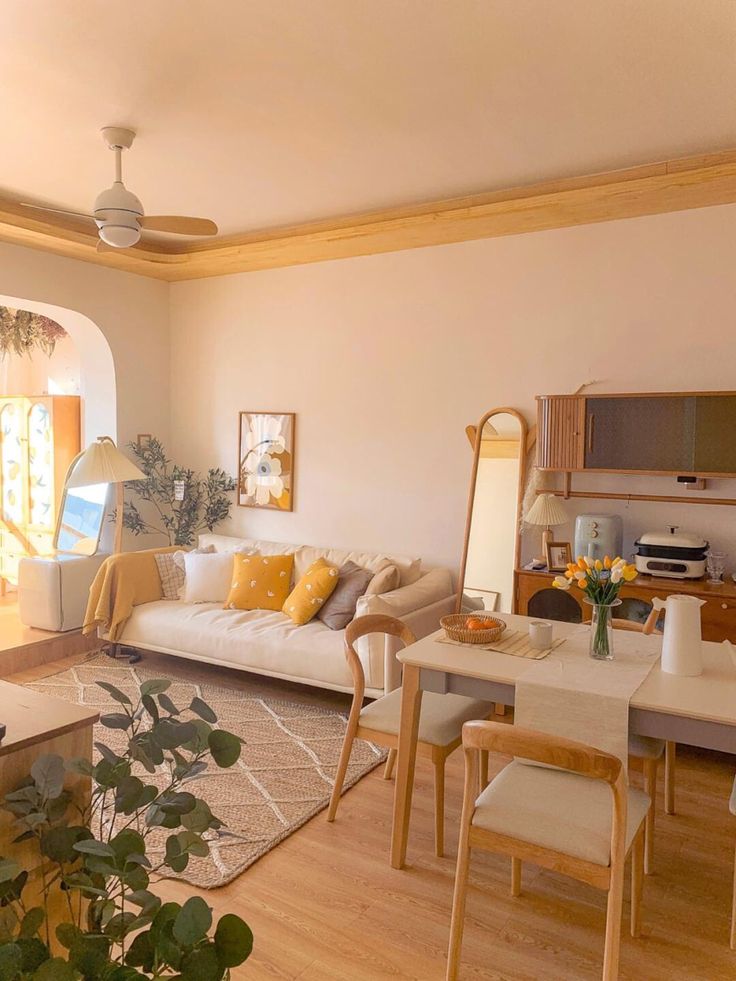 Living room and kitchen with wooden furniture
