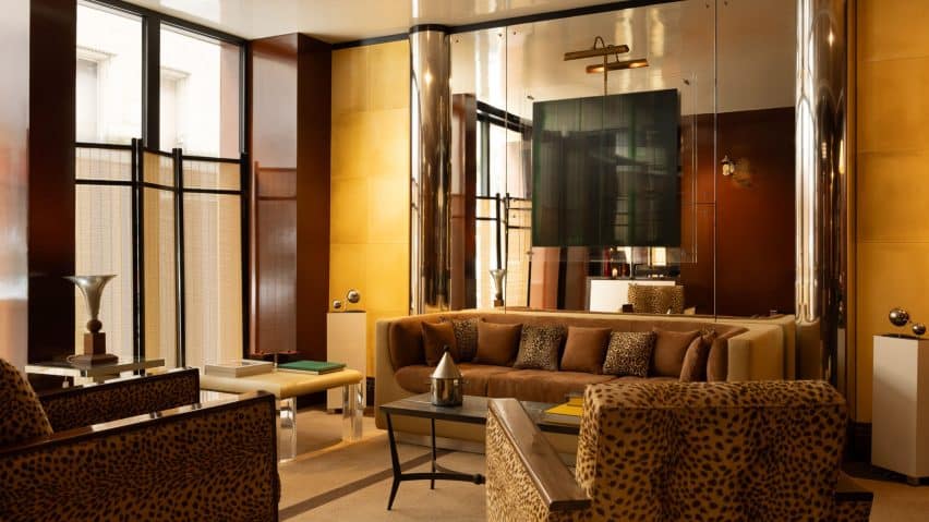 Necchi Architecture Evokes Retro Nightlife in Hotel Château d'Eau, Paris 1 A retro-inspired hotel room featuring black lacquer panels that enhance spatial perception.