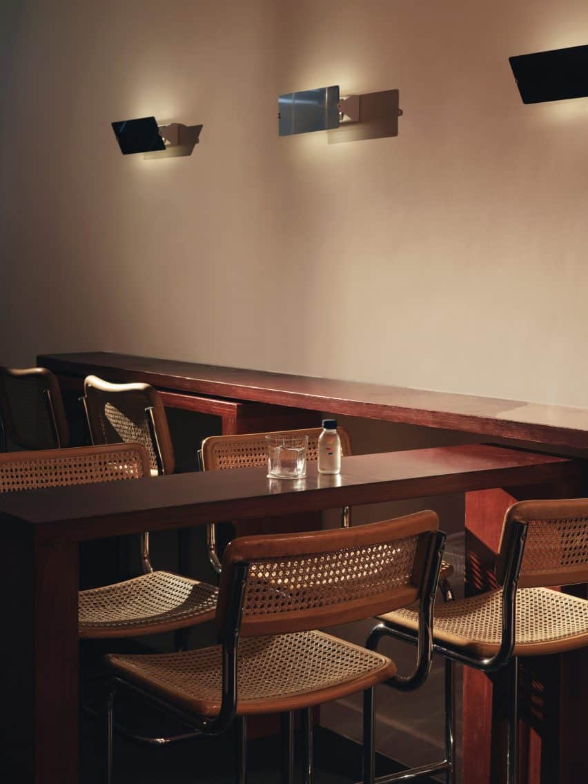 Tall tubular chairs feature on the ground floor.