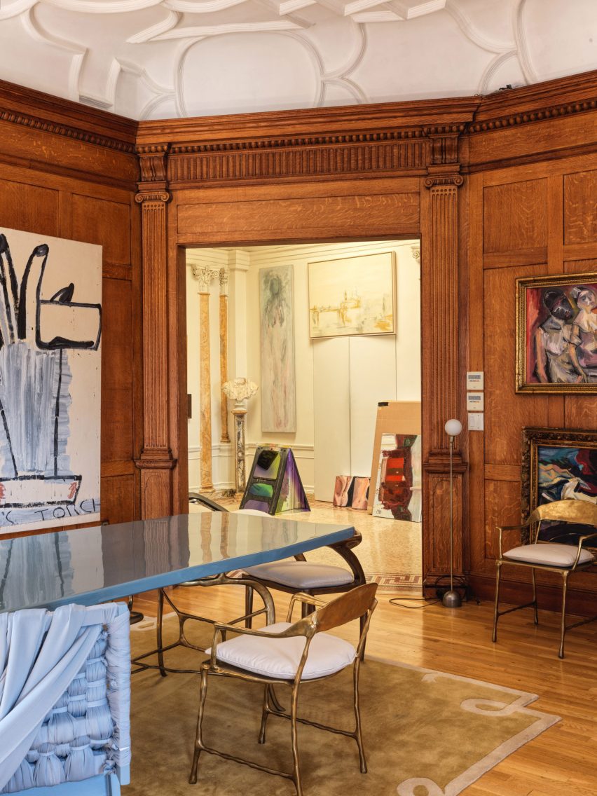Eccentric Redesign of Historic Tribeca Penthouse by Crina Arghirescu Rogard 4 A custom-designed pale-blue dining table by Liz Hopkins featured in the dining room.
