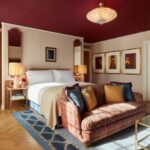 Interior of Broadwick Soho hotel designed by Martin Brudnizki, showcasing the vibrant and eclectic design.
