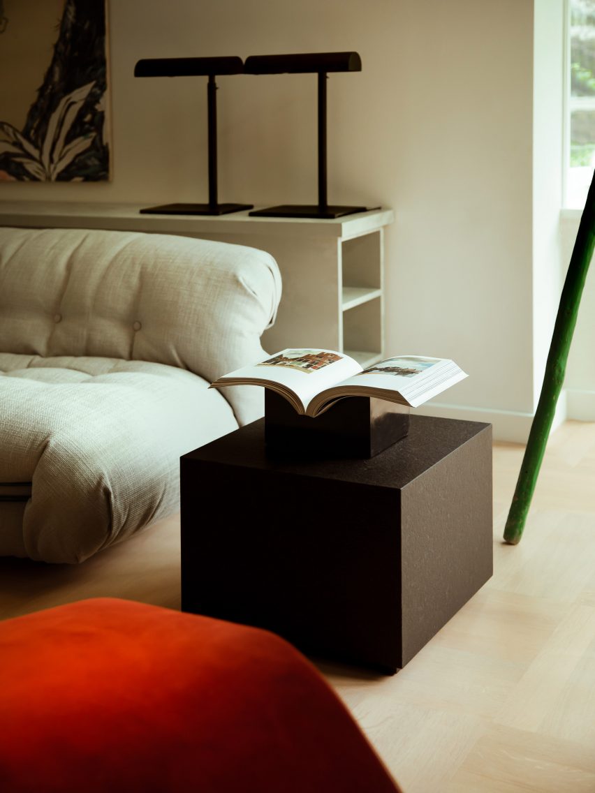 DAB Studio Revives 1920s Dutch Home with Contemporary Design 5 Furniture in the living space includes a recognizable Wassily Chair and a deep red Gubi chaise lounge.