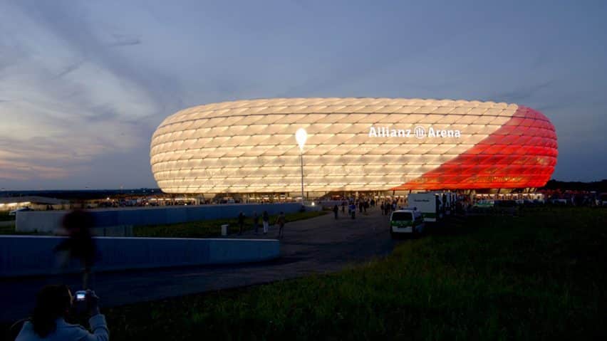 Allianz Arena on a night view showcasing its illuminated cladding.
