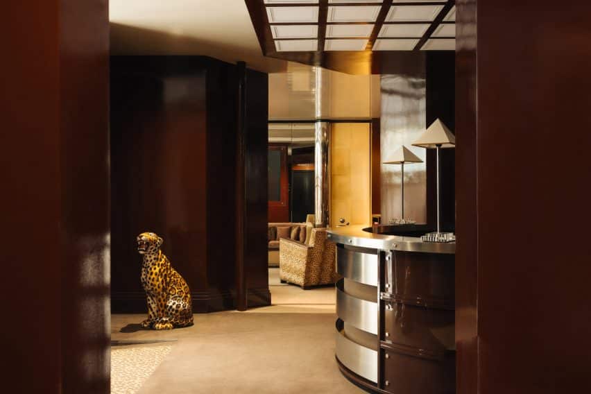 Necchi Architecture Evokes Retro Nightlife in Hotel Château d'Eau, Paris 4 The lounge area with leopard print accents incorporated into the design elements.