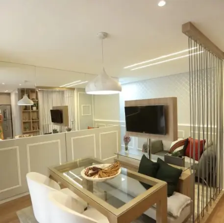 Transform Your Living Room with Stunning TV Panel Ideas. 7 White TV panel with wood is a combination that never goes out of style – Project: Ariadne Stein Arquitetura e Design