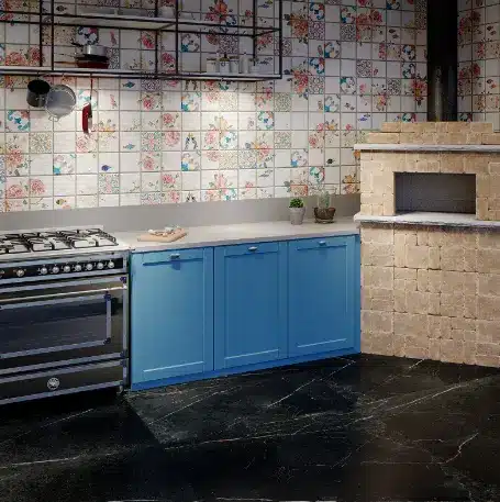 Stunning Ceramic Designs for Your Kitchen: Essential Tips to Choose. 2 Ceramic for kitchen: Negresco, specified on the floor, is a porcelain inspired by black marble with its marked white and orange veins – Photo: Ceusa