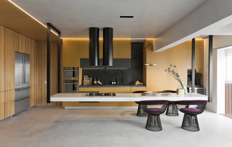 Five Stunning Colors That Perfectly Match Yellow. 2 Yellow and black stand out in this modern kitchen with an island - Design: Diego Revollo | Photo: Alain Brugier
