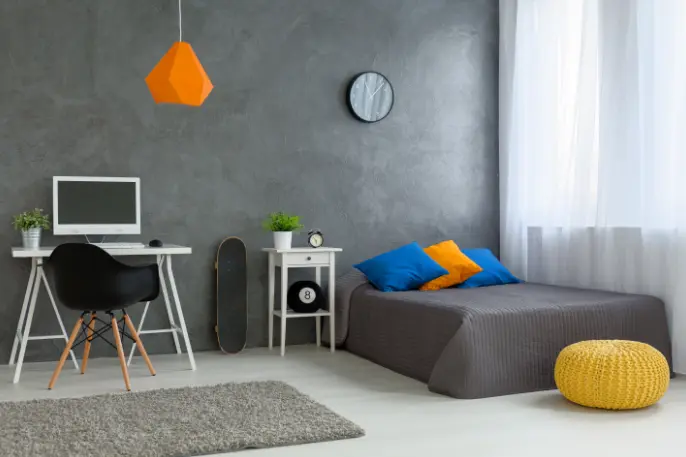 Stylish Tips to Transform Your Masculine Bedroom Today. 6 Neutral base + burnt cement paint + colorful details in this simple male bedroom – Photo: Shutterstock