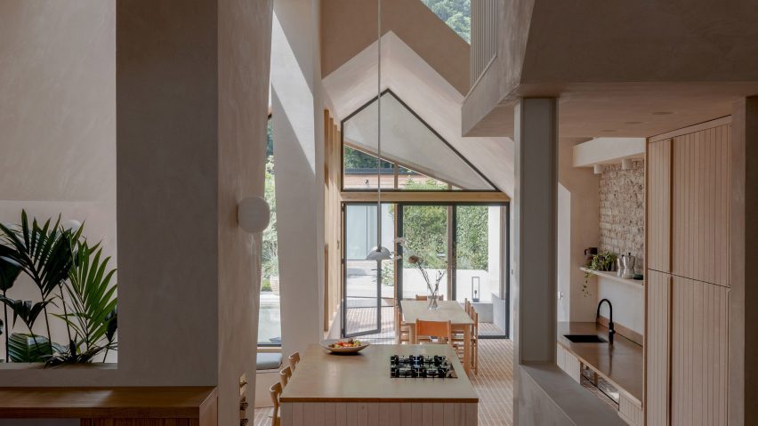 Image of Taper House in London featuring clay-plaster walls and exposed brickwork inspired by traditional Moroccan designs.
