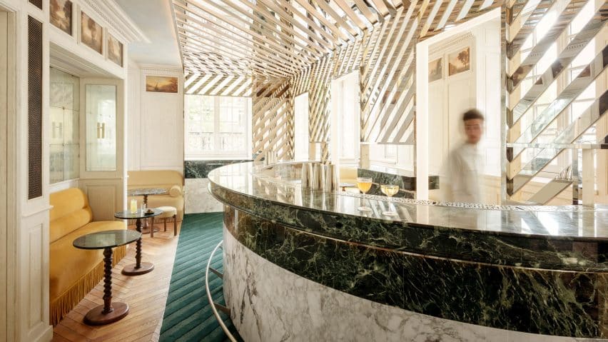 A visually striking image showcasing the Cravan cocktail bar with contemporary design elements.