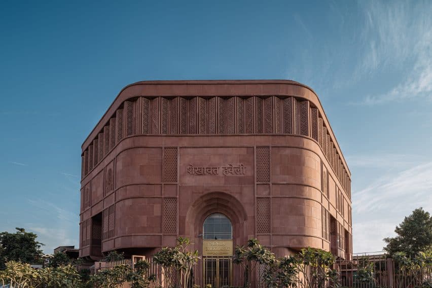 This view emphasizes the museum's design, featuring the beautiful blending of traditional frescoes and modern architecture.