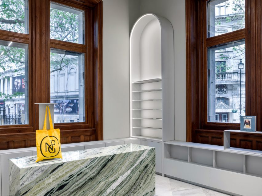 A shot of the green marble counter, emphasizing the modern finishes used in the design.