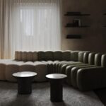 Puntofilipino brings noble materials to apartment in former bank office