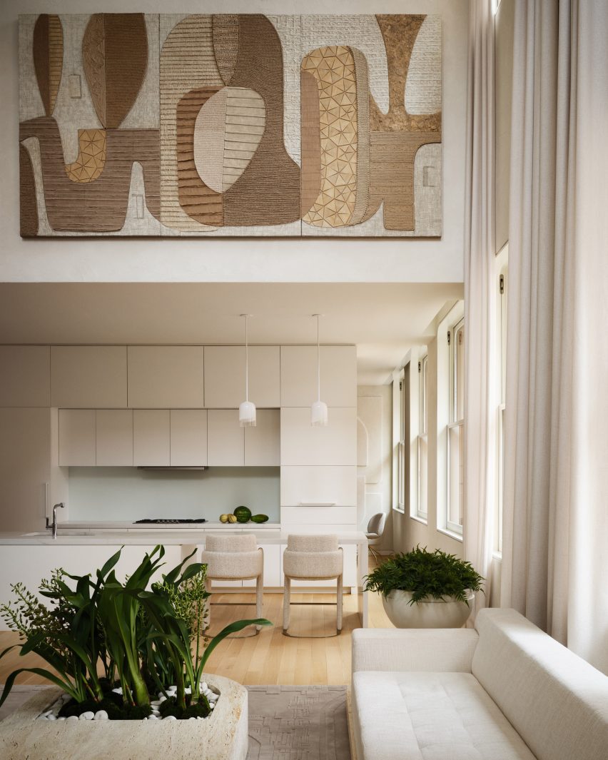 Timothy Godbold Transforms Tribeca Loft with Modernist Design Elements 4 Minimalist kitchen viewed from double-height living room