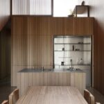 Australian hardwood lines a Melbourne cottage extension, showcasing a contemporary single-fronted design.