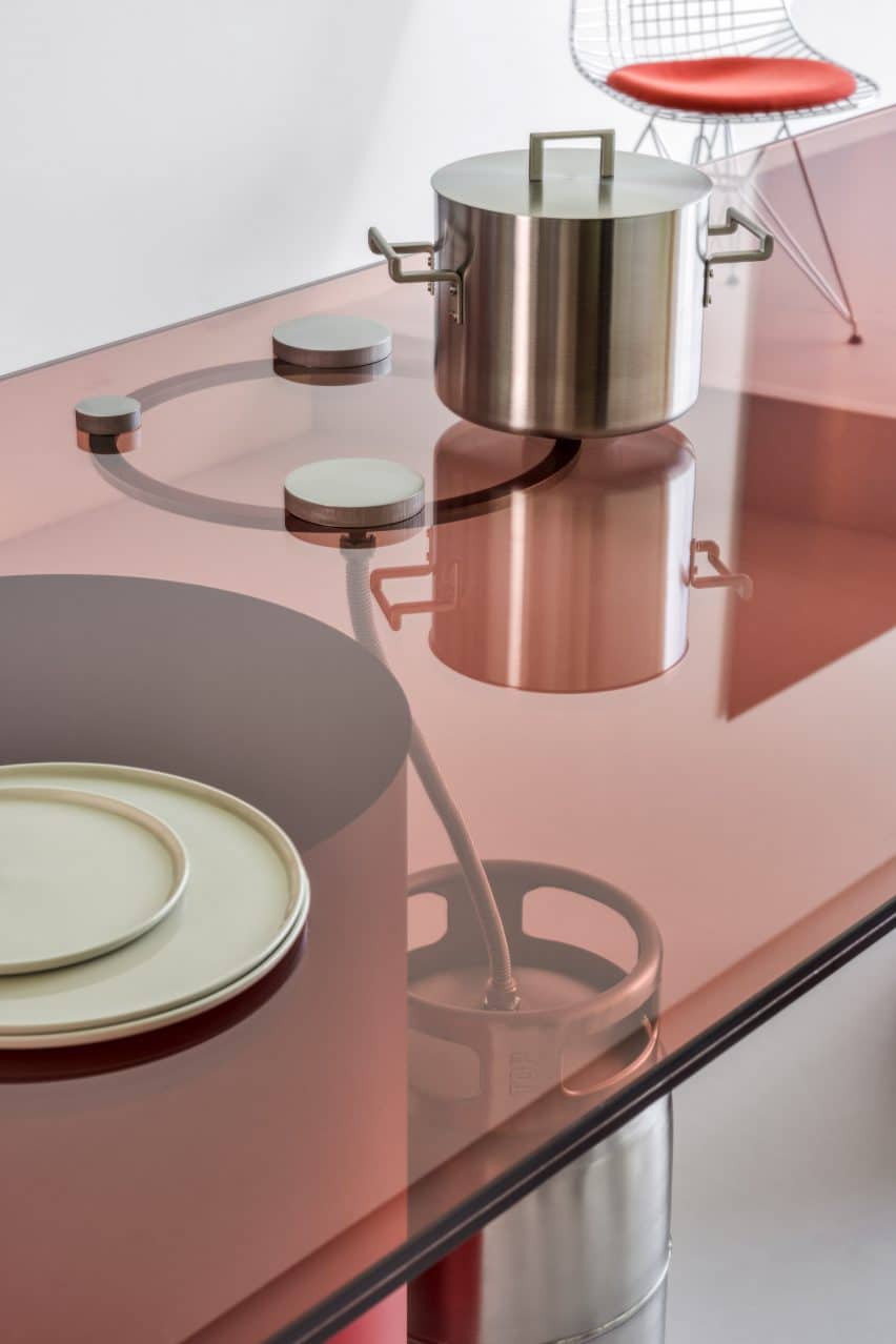 Sabine Marcelis Creates Color-Blocked Scenography for VitraHaus Loft 4 A glimpse of the kitchen area, emphasizing color-blocked furniture.