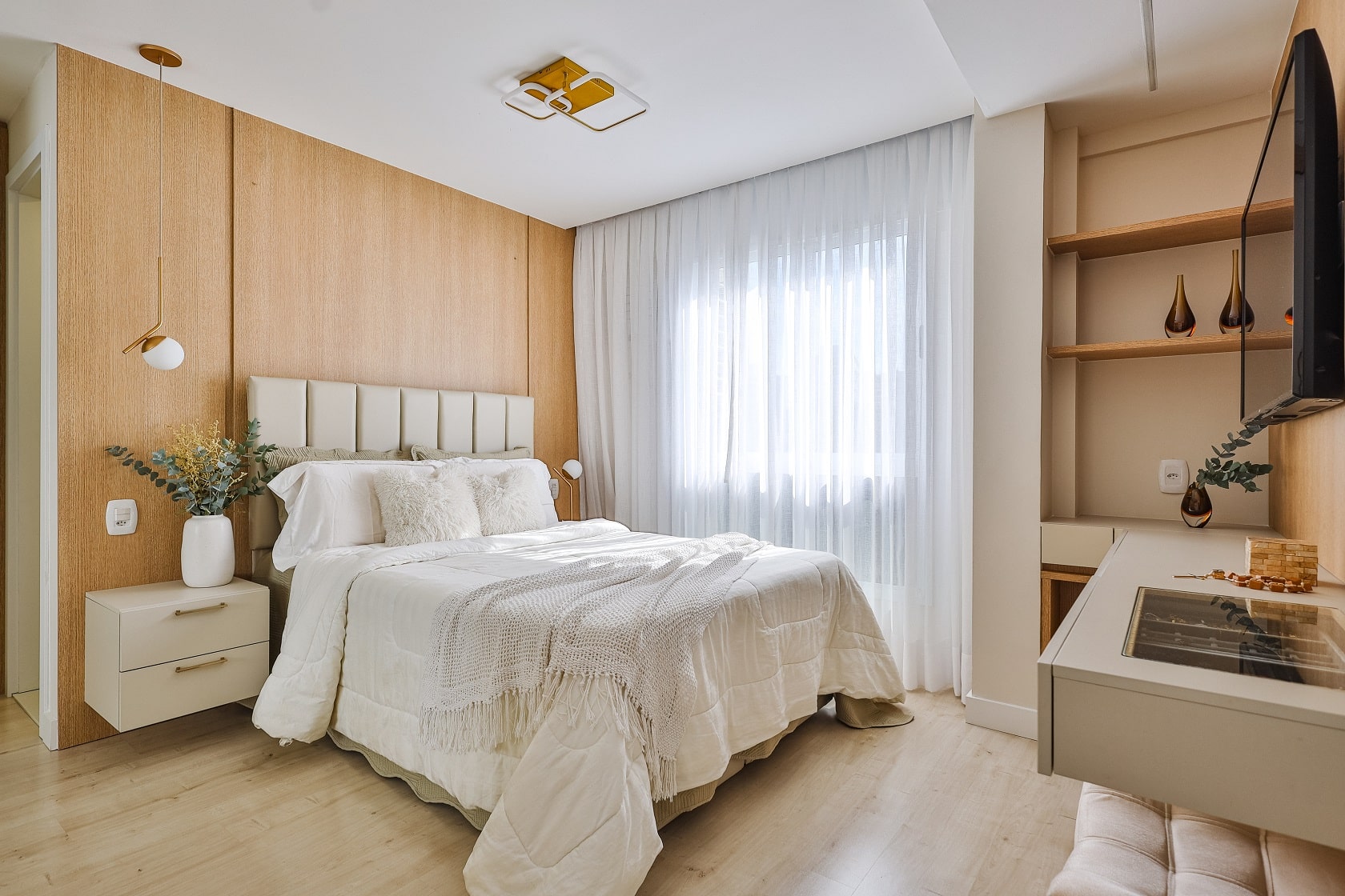 Master bedroom with upholstered headboard