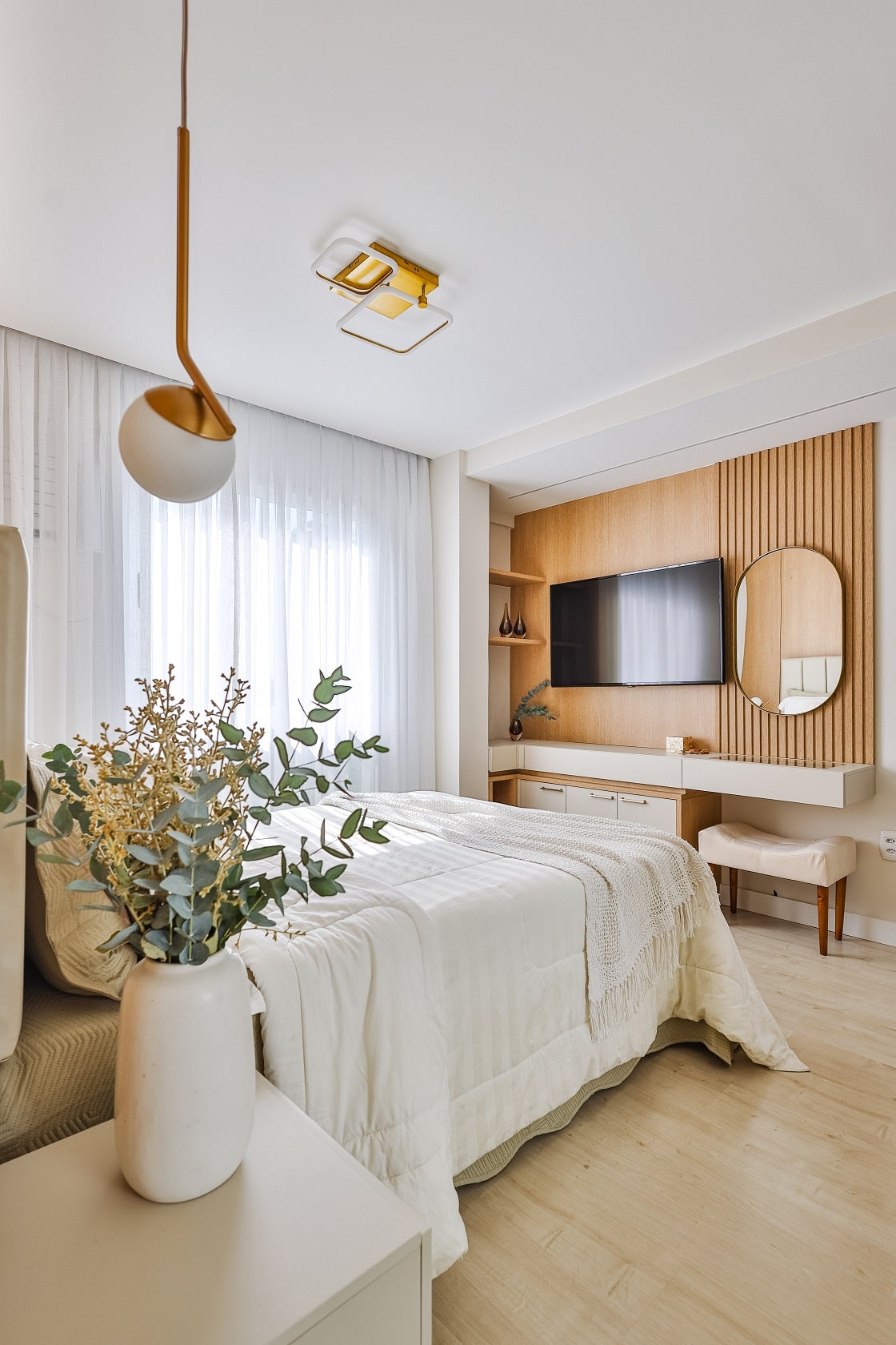 Master bedroom with wood panel and slatted woodwork