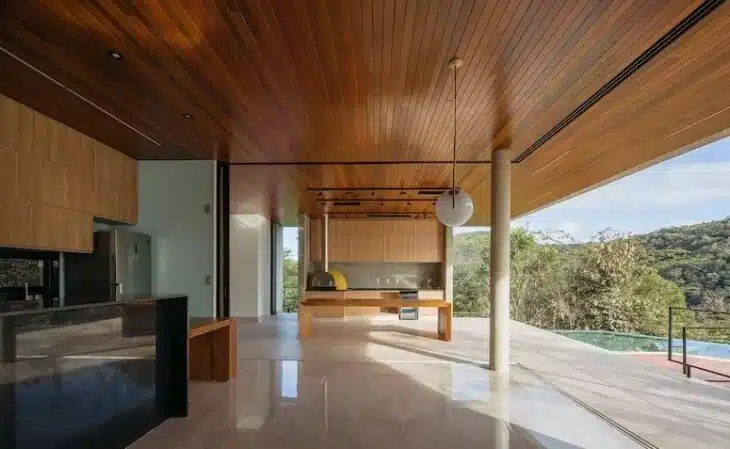 Open Concept Design: 25 Photos and Tips to Enhance Your Space 10 Exemplo de conceito aberto que proporciona maior socialização entre os moradores.