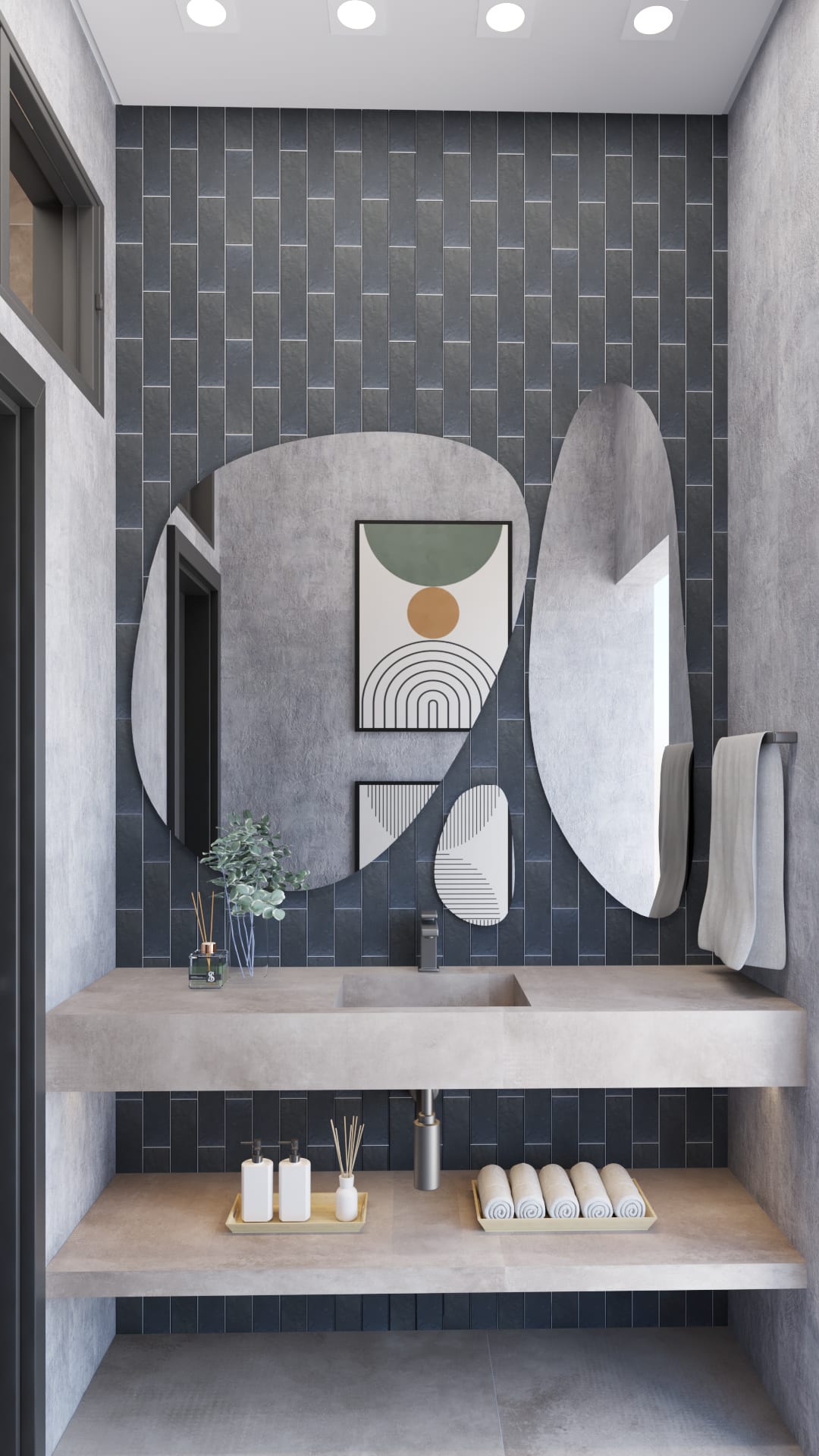 Lavabo em tons de cinza e off white com bancada em porcelanato, espelho com formato irregular e piso cinza.