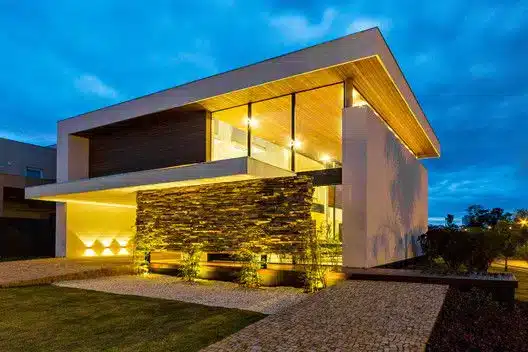 11 Inspiring Facade Designs for Duplex Homes 7 fachada de sobrado de vidro