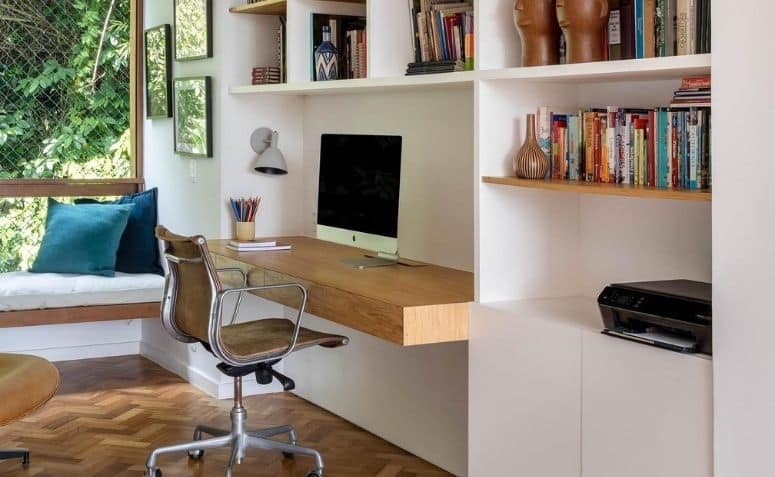 Imagem de uma decoração de home office com um ambiente bem arrumado e estiloso.