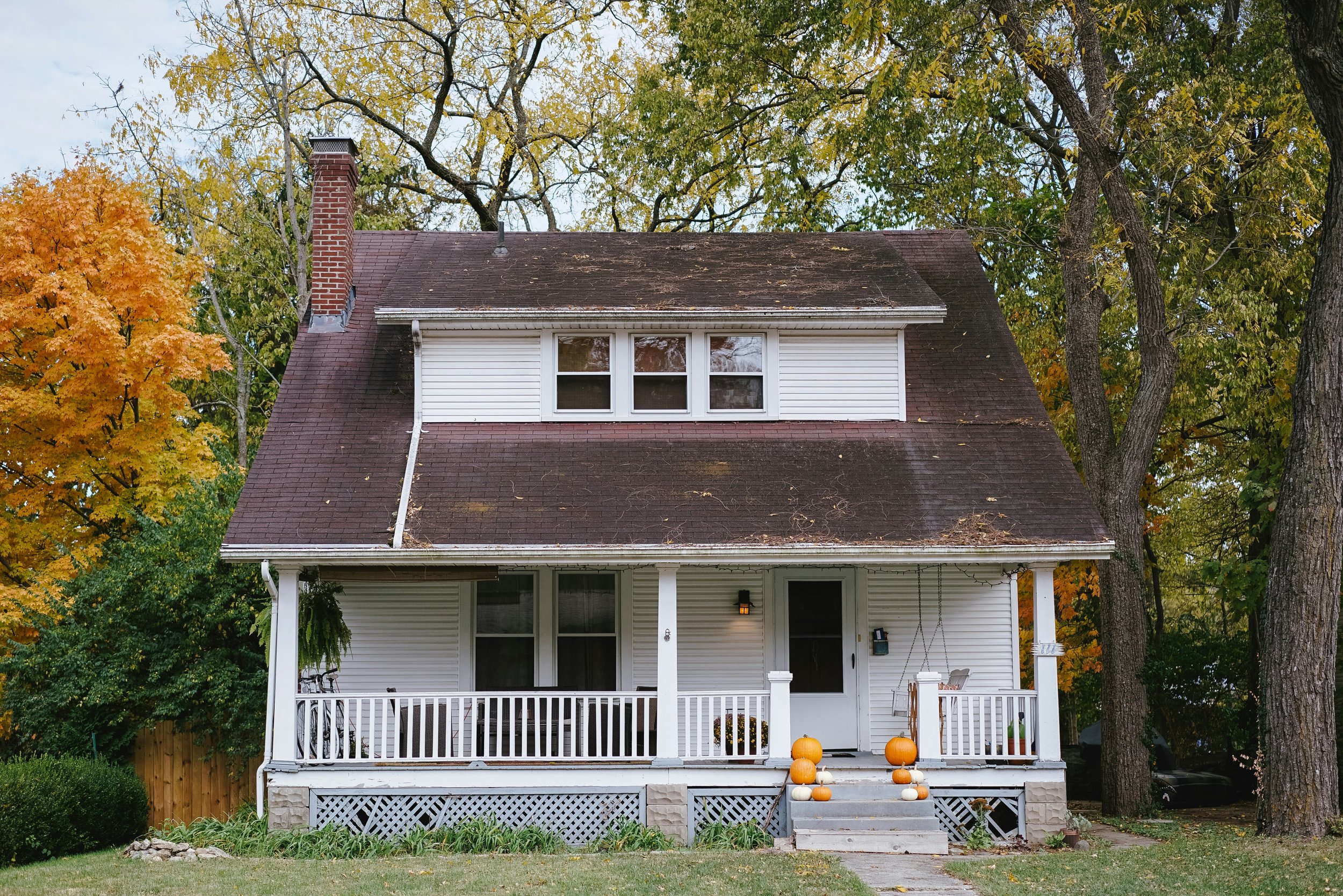 5 Signs You're Due for an Exterior Home Renovation 3 A beautiful exterior of a home with a stylish entrance, showcasing the importance of curb appeal.