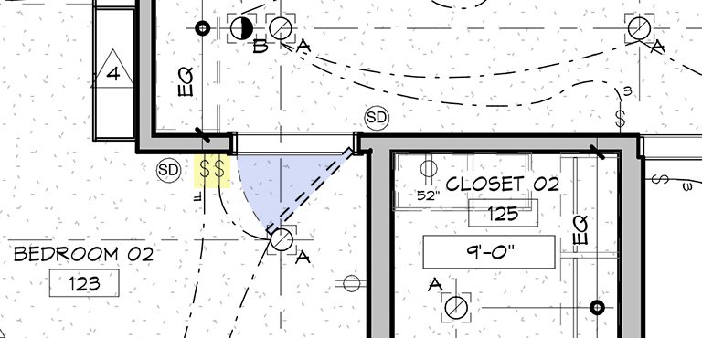 Este plano de teto refletido mostra portas e interruptores de luz.